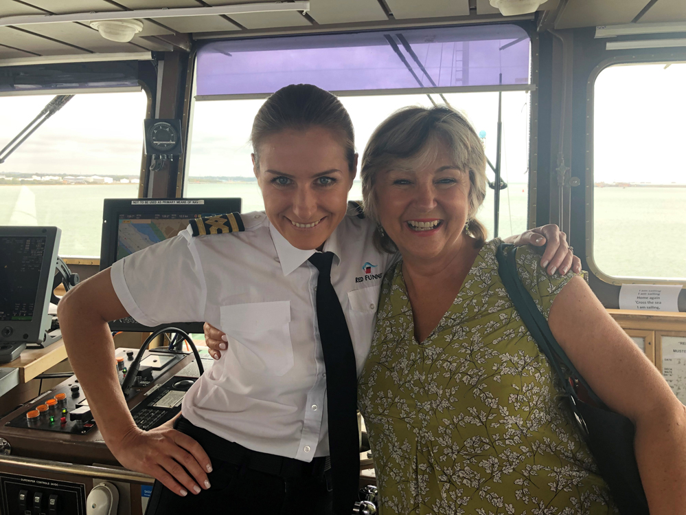 Opera singer Lesley Garrett with a Red Funnel Captain on the Bridge of Red Eagle ferry