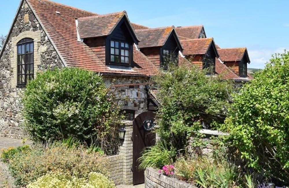 2 The Granary exterior and gate into the garden