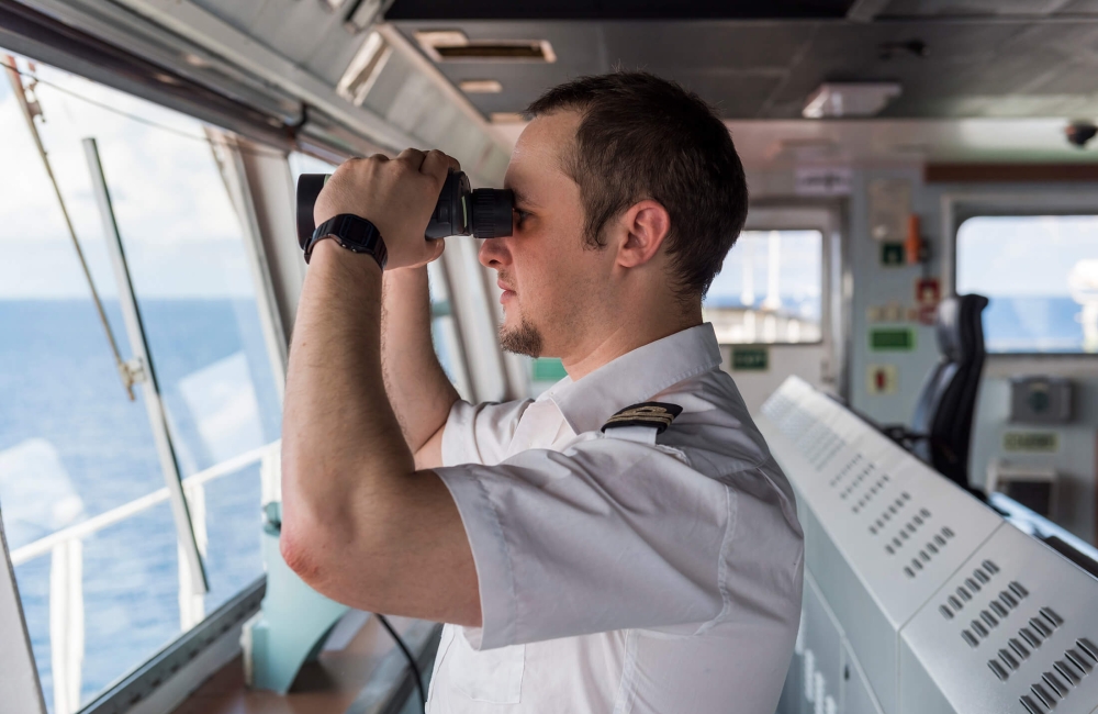 Ship captain with binoculars 