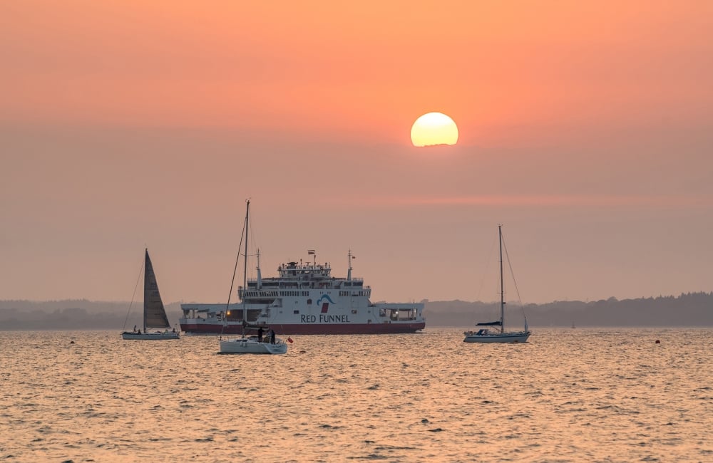 Image of the ferry on the water at dusk