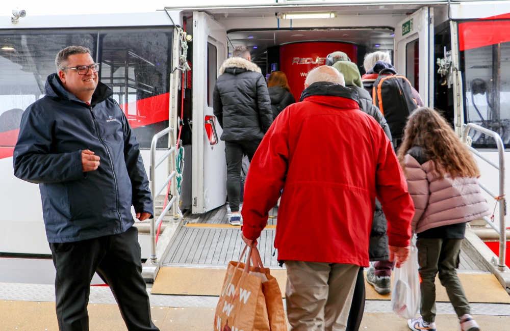 Red Funnel Staff with foot passengers