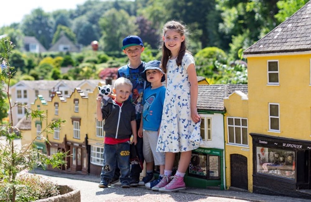 Godshill Model Village four children standing in the model village