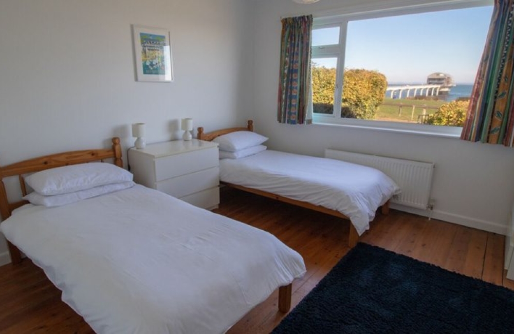 Hilvana twin bedroom with a view of Bembridge Lifeboat Station