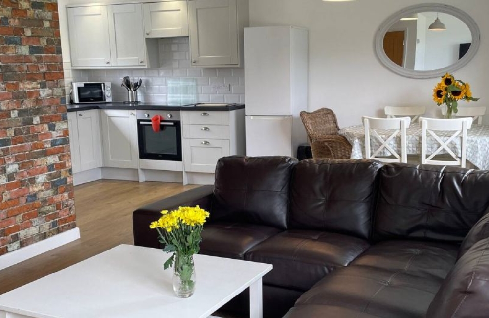 A representation of a 3 bedroom cottage living area at The Gallops
