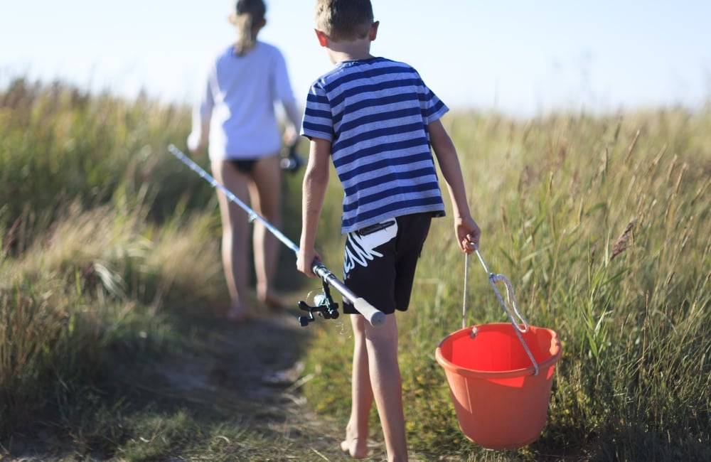 kid-with-bucket-and-fishing-rod