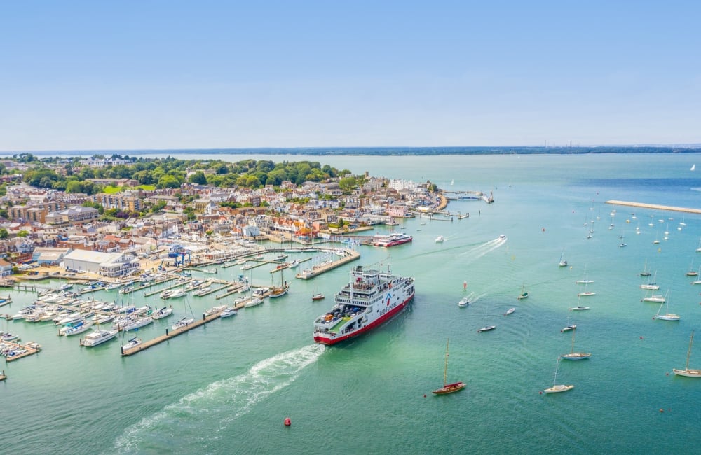 drone photo of ferry sailing past cowes