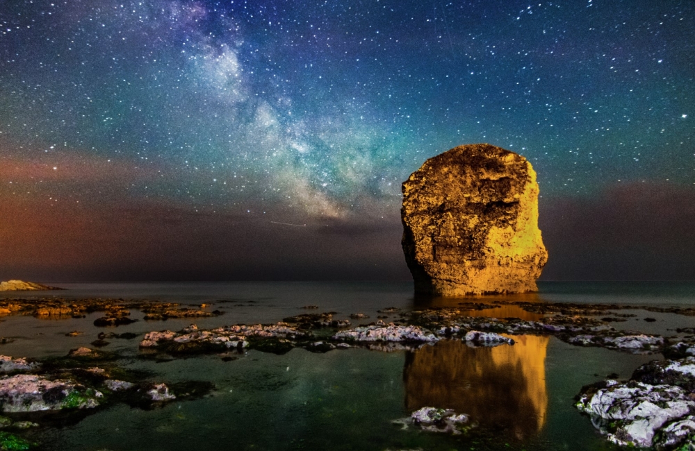 milky way over stag rock at freshwater bay
