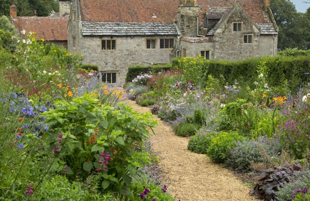 A path through the garden leading to Mottistone Manor Farmhouse