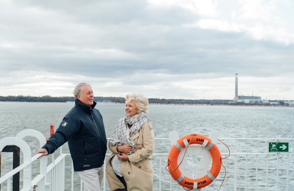 two people talking on the outer decks