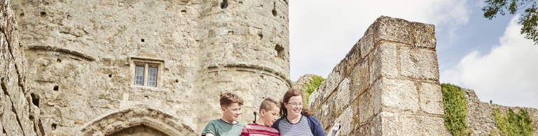 Family with a castle in the background