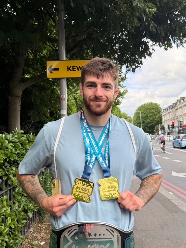 Corey Kent with his medal