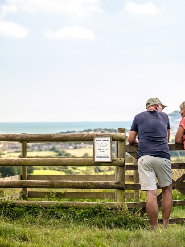 a couple take in the views from brading down