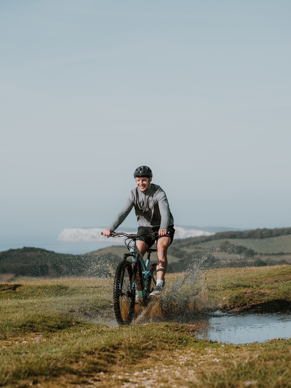 Group of friends mountain biking on a trail 