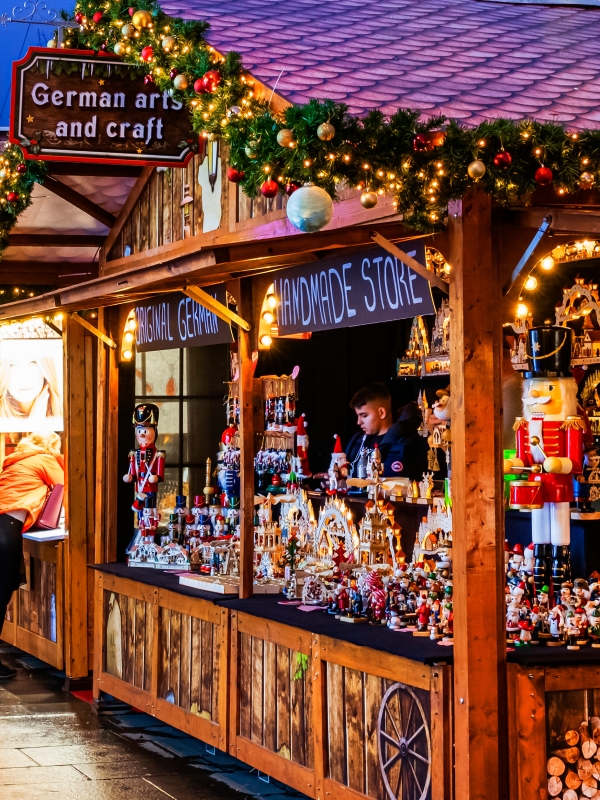 wooden cabin decorated with Christmas lights