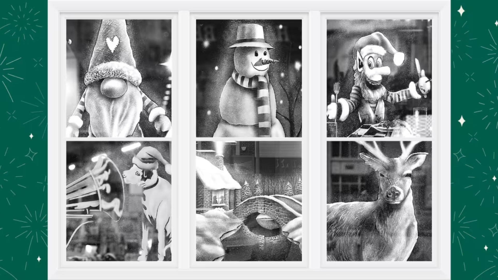 christmas scenes painted on windows with snow spray