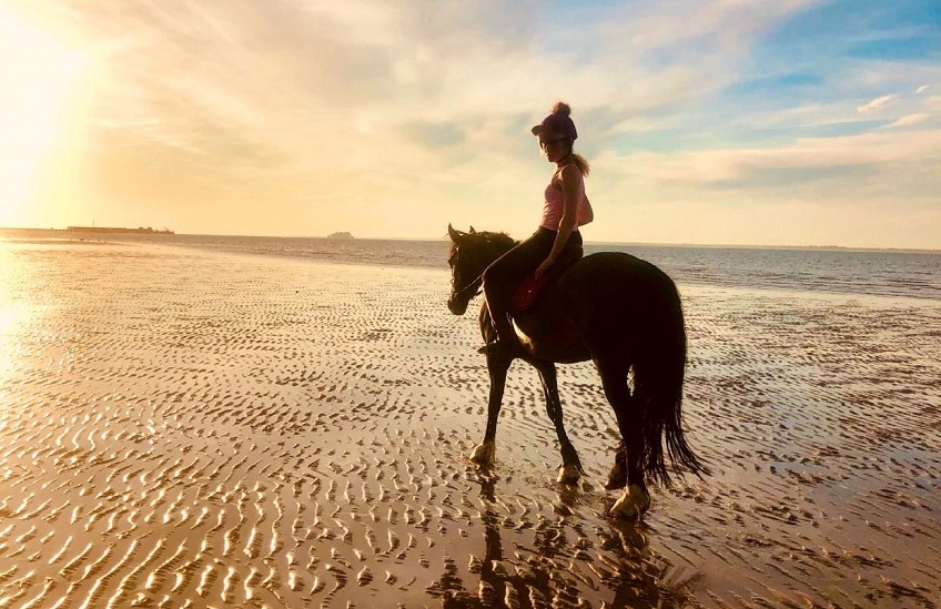 Horse riding on the beach