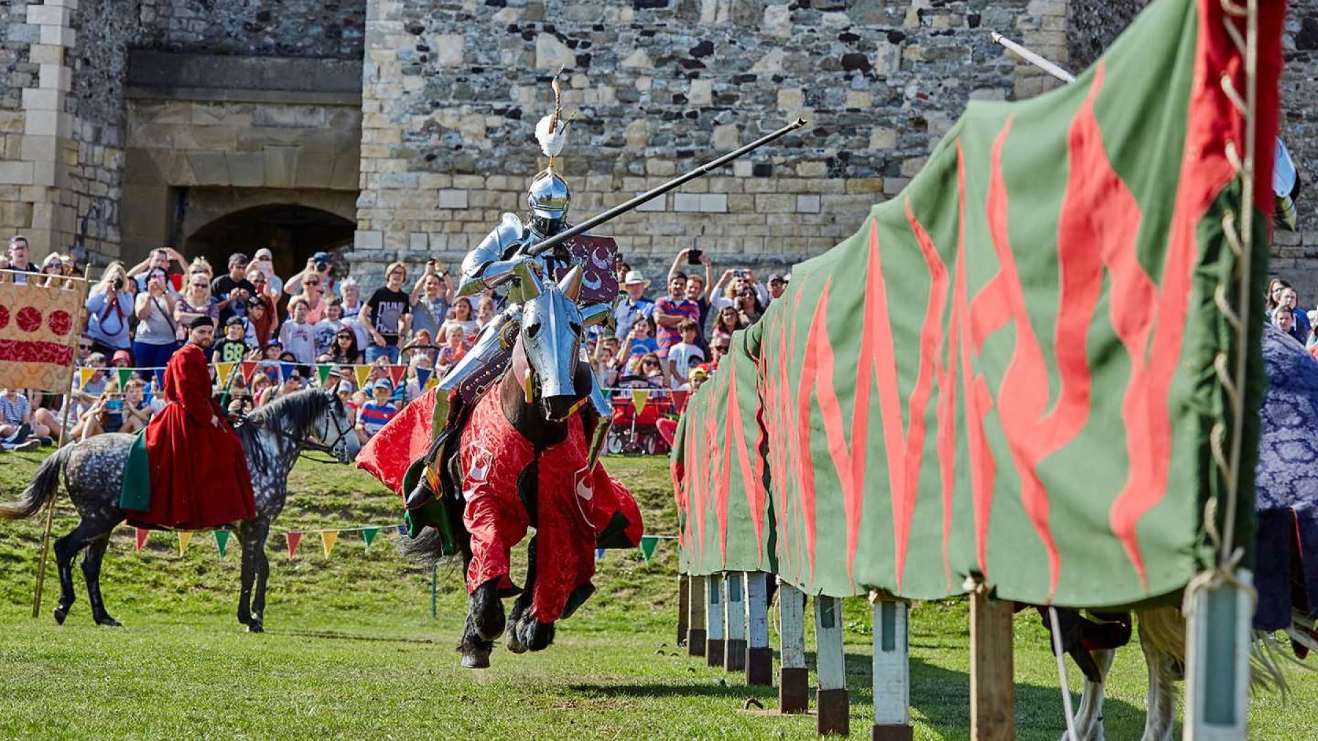 a knight on horseback holding a jousting lance