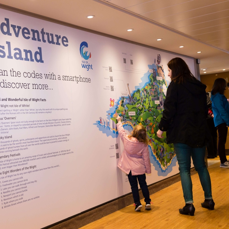 Girl Points at IOW map