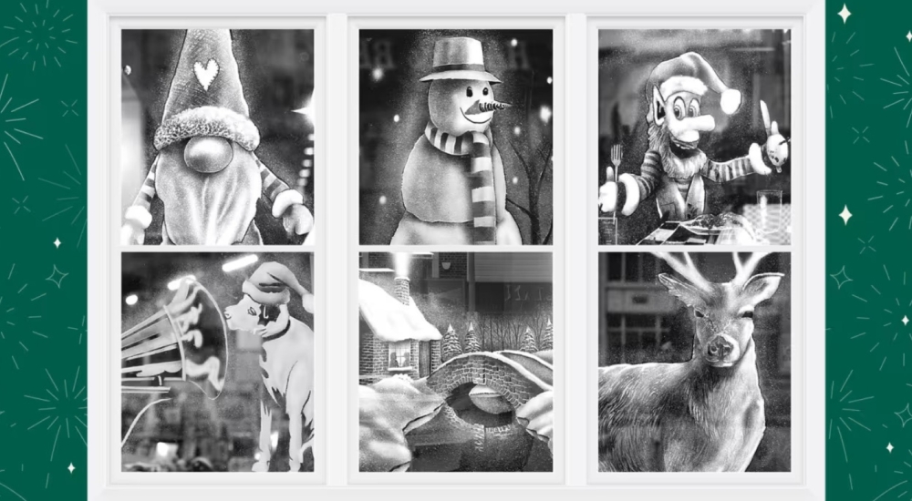 christmas scenes painted on windows with snow spray