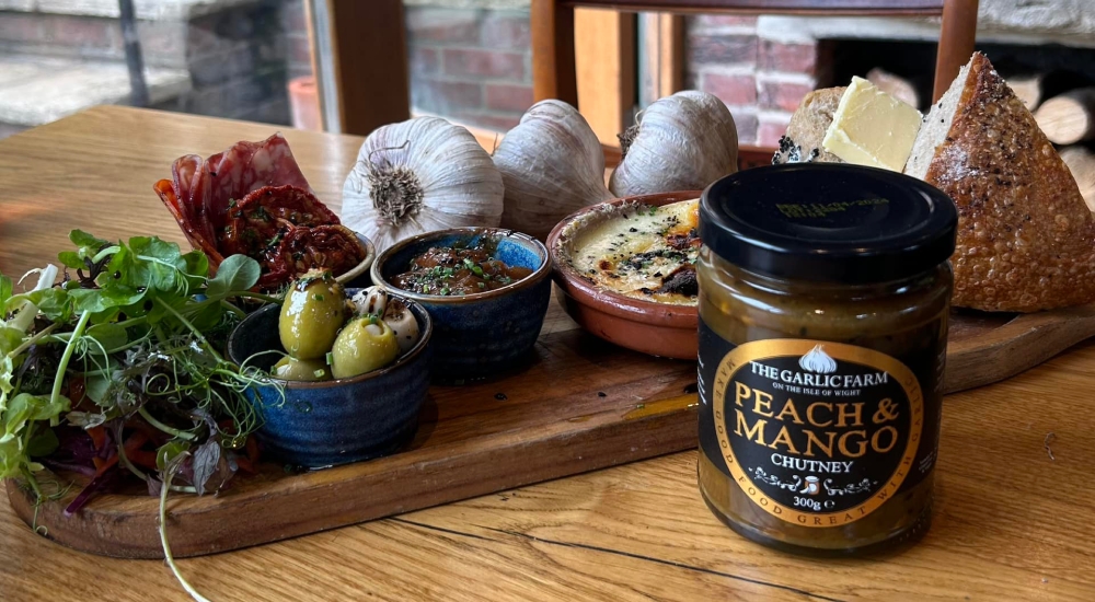 platter of food and garlic farm produce on a table