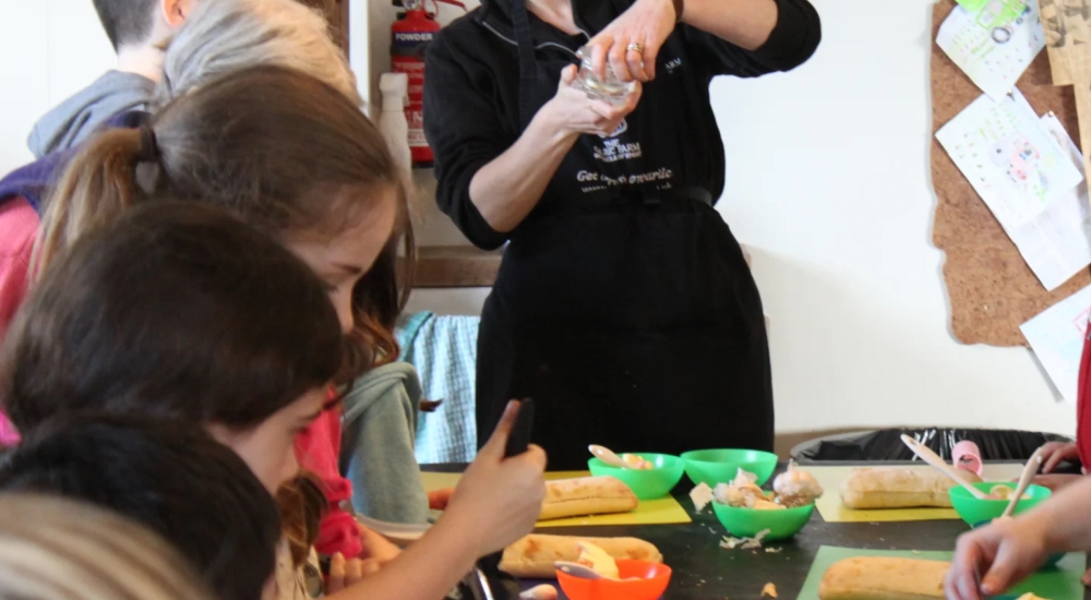 children making garlic bread