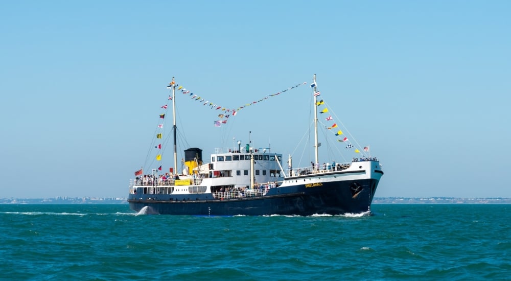 steamship shieldhall at sea with dress flags