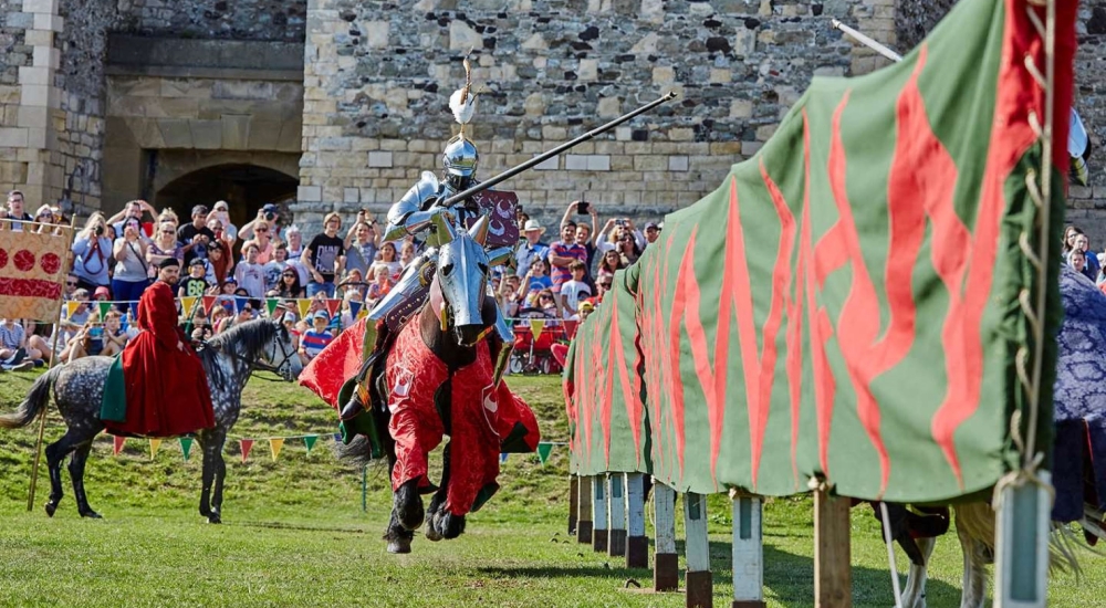 a knight on horseback holding a jousting lance