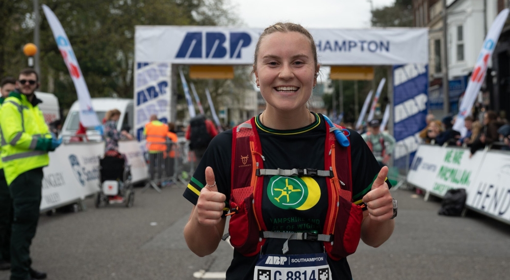 a marathon runner in hampshire and isle of wight air ambulance t shirt